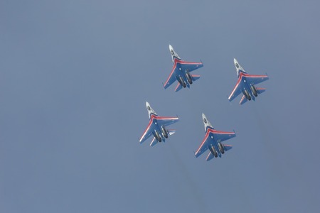 Omsk, Russia - March 19, 2016: Fighter Sukhoi Su-27 show aerobatics at an airshow Russian Knights.のeditorial素材