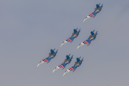Omsk, Russia - March 19, 2016: Fighter Sukhoi Su-27 show aerobatics at an airshow Russian Knights.のeditorial素材