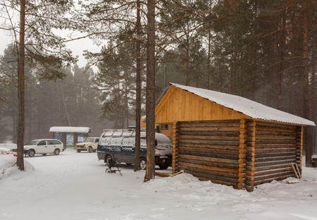 Baikal, Russia - March 06, 2016: Wooden house with administration at the entrance of Trans-Baikal National Park.のeditorial素材