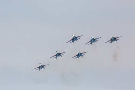 Omsk, Russia - March 19, 2016: Fighter Sukhoi Su-27 show aerobatics at an airshow Russian Knights.のeditorial素材