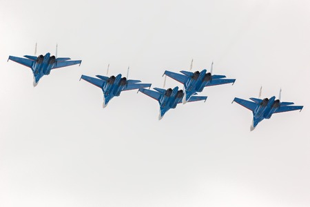 Omsk, Russia - March 19, 2016: Fighter Sukhoi Su-27 in airshow Russian Knights.