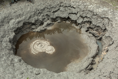 Mudpot in the Uzon Caldera. Kronotsky Nature Reserve on Kamchatka Peninsula.