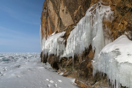 Huge icicles on rocks. Beautiful winter landscape in the Lake Baikal.の写真素材