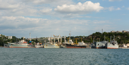 Sevastopol, Russia - June 09, 2016: Russian and Soviet Black Sea Fleet warships, standing in quay of Sevastopol bay, Crimeaのeditorial素材