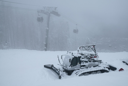 Sochi, Russia - January 21, 2017: Snow grooming on slope of ski resort Gorky Gorodのeditorial素材