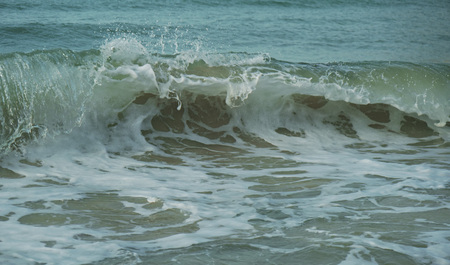 Beautiful waves of the South China Sea on Dadonghai beach.