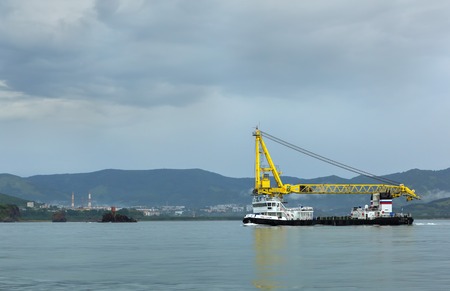 Petropavlovsk-Kamchatsky, Russia - August 15, 2016: New self-propelled floating crane SPK-43150 in the Pacific Ocean.のeditorial素材