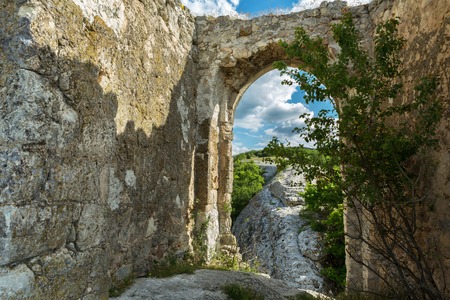 Gate on the Tapshan Plateau of Cave City in Cherkez-Kermen Valley, Crimeaの写真素材