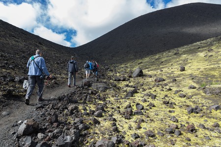 Kamchatka Peninsula, Russia - August 20, 2016: Tourists on excursions in places of Hiking trail climb to the North Breakthrough Great Tolbachik Fissure Eruption 1975のeditorial素材