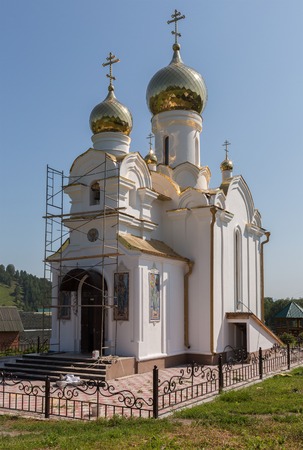Kaimskoye, Russia - July 18, 2015: Church on the territory of the Recreation center health-improving center maral breeding farm Kaimskoye is located on the territory of the Altai kraiのeditorial素材