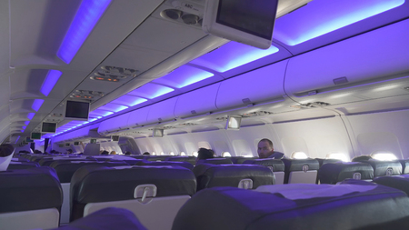 Dubai, UAE - April 10, 2018: Aircraft salon with passengers during the flightのeditorial素材