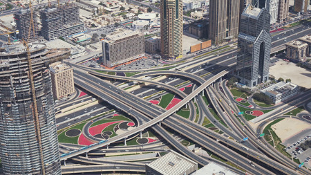 Dubai, UAE - April 09, 2018: Modern urban multi-level road junctions in Downtown Dubai view from the...