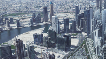 Dubai, UAE - April 09, 2018: Modern skyscrapers in the area of the water channel Dubai Creek in Downtownのeditorial素材