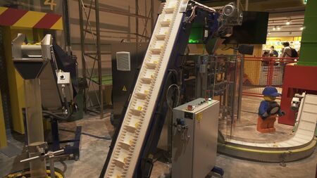 Dubai, UAE - April 01, 2018: Demonstration of the technological process of manufacturing the details of the designer in the Lego factory in Dubai Legoland at Dubai Parks and Resortsのeditorial素材