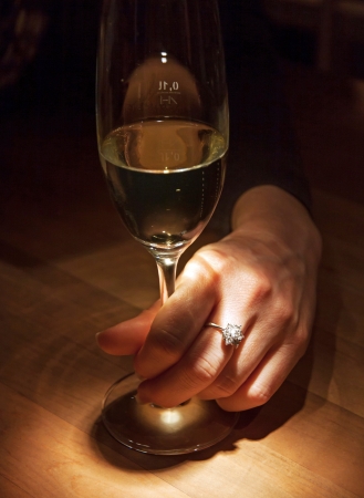 Woman hand with a diamond ringの写真素材
