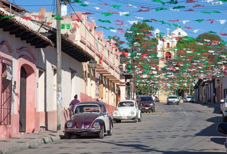 SAN CRISTOBAL DE LAS CASA, MEXICO - FEBRUARY 7, 2013  VW Beetle parked in a street in San Cristobal de las Casas, Mexico, on a sunny dayのeditorial素材