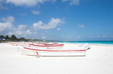 The beach of Tulum with boat on the sand, Mexicoの写真素材