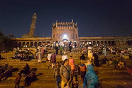 JAMA MASJID, DELHI, INDIA - OCTOBER 11, 2015: The stairs of the principal door of the largest mosques in India with people entering. The mausoleum is visited by thousands of Muslims people every week. The courtyard can accommodate more than 25,000 personsのeditorial素材