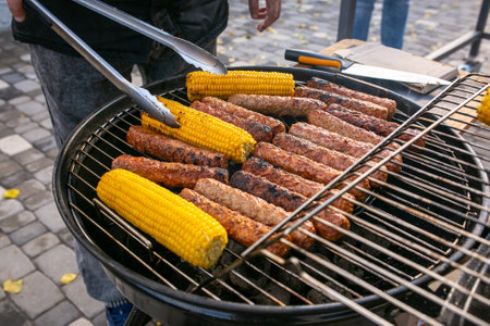 grilled meat, steak, baked corn, barbecue, guests, picnic. nature, food, deliciousの写真素材