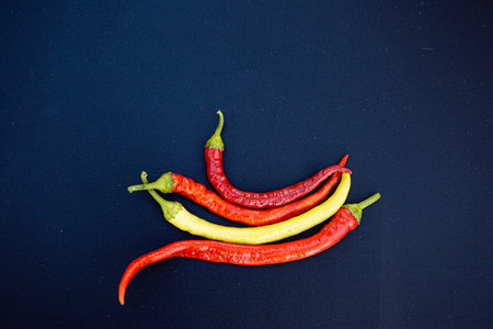 chili pepper on isolated black backgroundの写真素材
