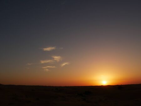 Sunset in Arabian desert without peopleの写真素材