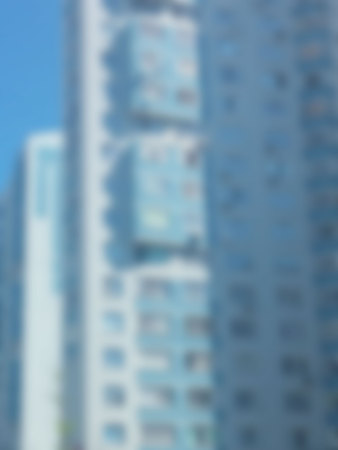 Blurred abstract urban background with Blurry high-rise building. Vector illustrationのイラスト素材