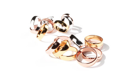 Gold rings heap 3d renderの写真素材