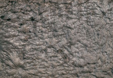 Bumped concrete wallの写真素材