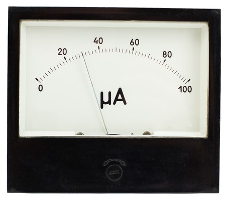 Black square analog ampermeter isolated on white background with 30 uA reading on scale.の写真素材