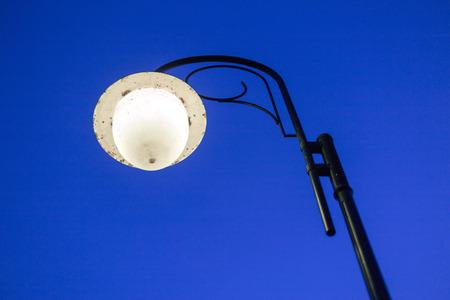 street lamp post on evening deep blue skyの写真素材