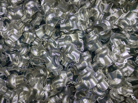 Shiny formed aluminium parts backgroundの写真素材