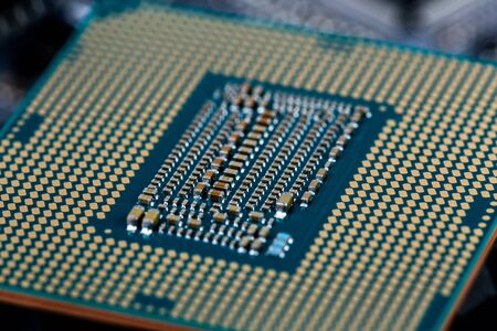 back side of modern lga 1151v2 central processor unit - closeup with selective fcus and blur