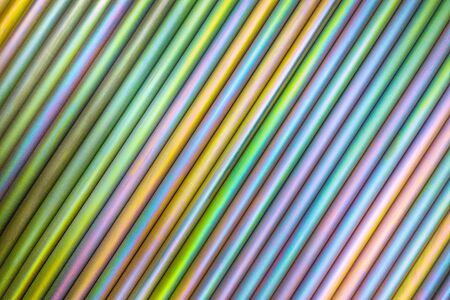 An abstract lines backround of colorful cadmium coated steel bars. Horizontal orientation with diagonal direction.の写真素材