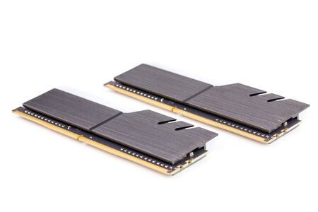 a pair of ddr4 dimm pc ram memoty modules with stylish black heatsinks - isolated on white with...