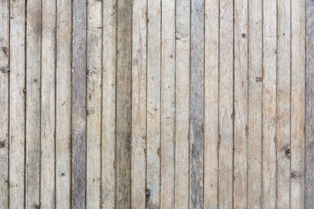 flat texture and background of vertical gray thin solid wooden planks - old, dry and dusty