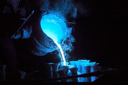 steel casting process toned blue for magic potion or chemical or biohazard or radioactive waste...