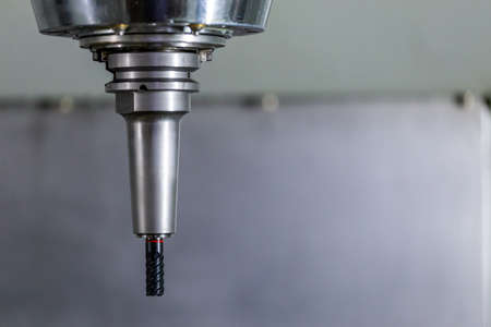 carbide mill in slim hydraulic chuck in vertical cnc milling machine