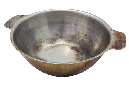 Old stainless steel bowl isolated on white backgroundの写真素材