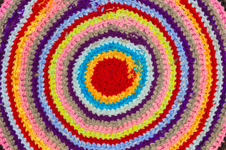 Traditional Russian round knit Mat handmade backgroundの写真素材