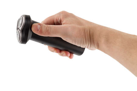 bare caucasican hand holding three razor black electric shaver - isolatedの写真素材