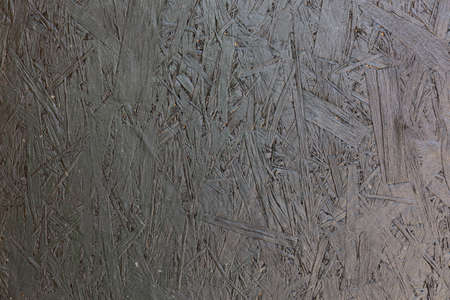 dark grey painted OSB surface background and texture