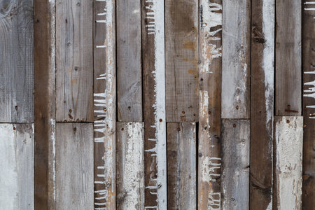 old used wooden planks flat surface of barn wall or fenceの写真素材