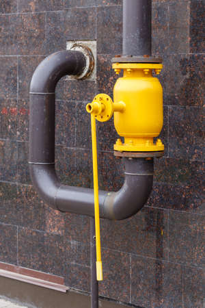 large yellow natural gas ball valve with long leverの写真素材