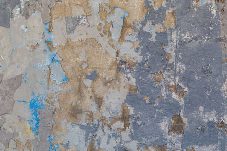 shabby weathered artistically peeled off blue and gray paint