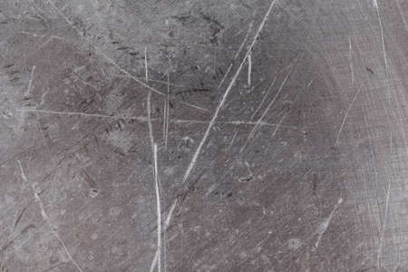 scratched real life old aluminuim flat sheet texture and full frame backgroundの写真素材