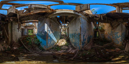 360 by 180 degree full spherical panorama inside of an abandoned half-destroyed dormitory at summer daylightの写真素材