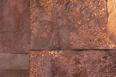 Rusted tin sheets patchwork wall texture and flat full frame background