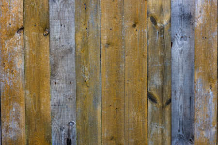 old dry weathered gray and brown wooden planks board surface - full frame background and texture
