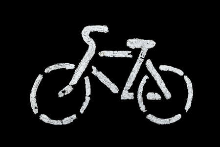 bicycle sign on asphalt with old white paint - isolated on black background
