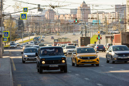 car traffic at the autumn morning sun light in central streets of Tula, Russiaのeditorial素材